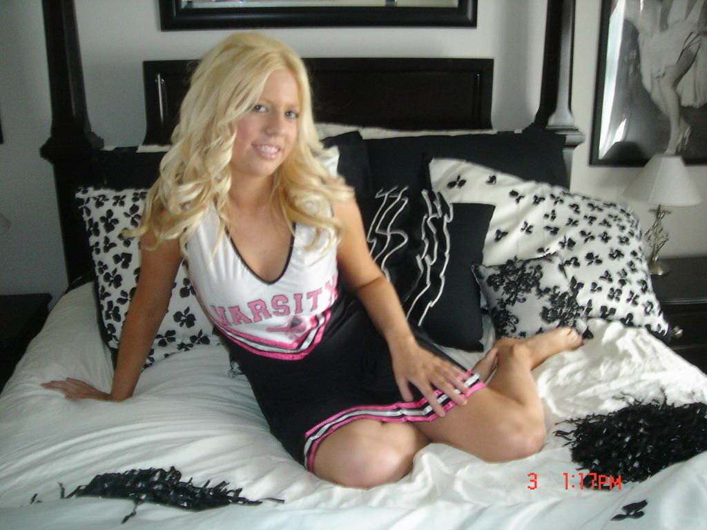 Blonde cheerleader posing and masturbating — 36