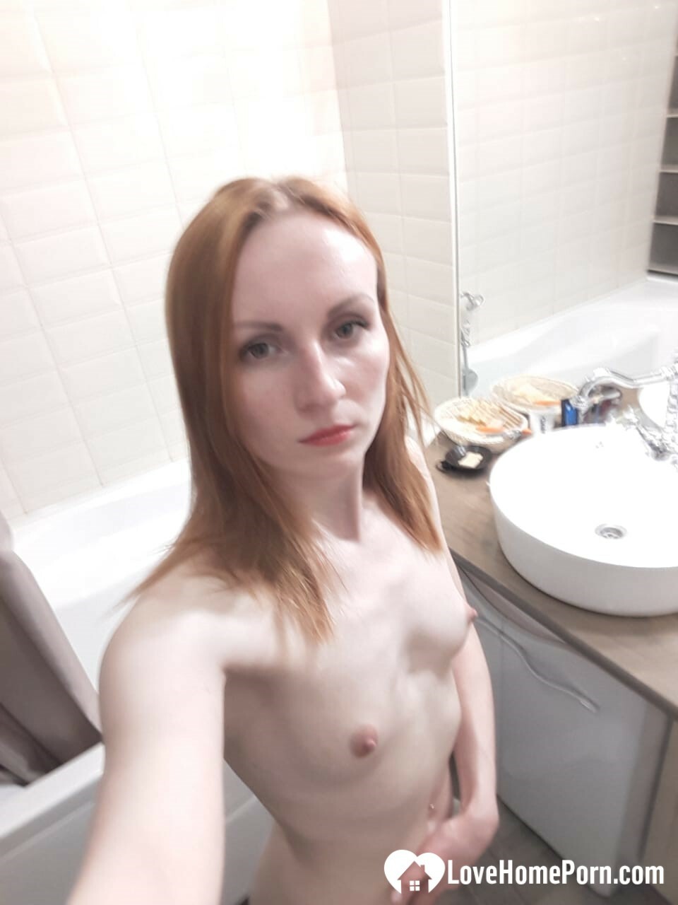 Skinny redhead with small tits in the mirror — 11
